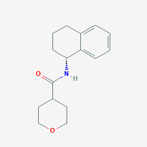 molecular formula C16H21NO2 B7546744 N-[(1R)-1,2,3,4-tetrahydronaphthalen-1-yl]oxane-4-carboxamide 
