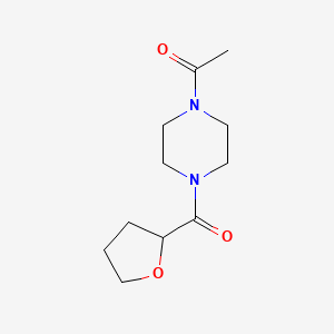 1-[4-(Oxolane-2-carbonyl)piperazin-1-yl]ethanone