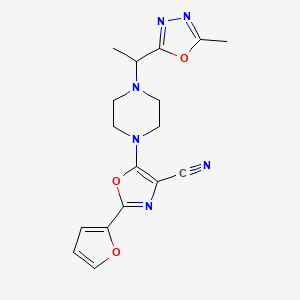 molecular formula C17H18N6O3 B7551312 2-(Furan-2-yl)-5-[4-[1-(5-methyl-1,3,4-oxadiazol-2-yl)ethyl]piperazin-1-yl]-1,3-oxazole-4-carbonitrile 