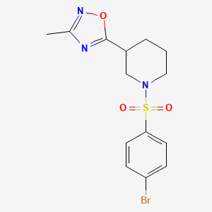 molecular formula C14H16BrN3O3S B7552050 5-[1-(4-Bromophenyl)sulfonylpiperidin-3-yl]-3-methyl-1,2,4-oxadiazole 