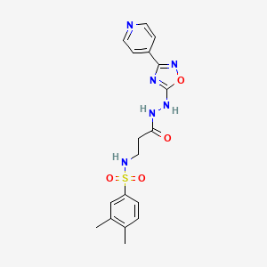 3,4-dimethyl-N-[3-oxo-3-[2-(3-pyridin-4-yl-1,2,4-oxadiazol-5-yl)hydrazinyl]propyl]benzenesulfonamide