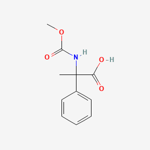 molecular formula C11H13NO4 B7555499 2-Methoxycarbonylamino-2-phenyl-propionic acid 