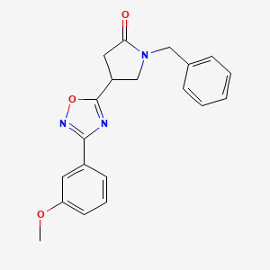 molecular formula C20H19N3O3 B7558287 1-Benzyl-4-[3-(3-methoxyphenyl)-1,2,4-oxadiazol-5-yl]pyrrolidin-2-one 