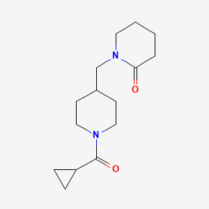 molecular formula C15H24N2O2 B7563257 1-[[1-(Cyclopropanecarbonyl)piperidin-4-yl]methyl]piperidin-2-one 