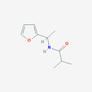 molecular formula C10H15NO2 B7564747 N-[1-(furan-2-yl)ethyl]-2-methylpropanamide 
