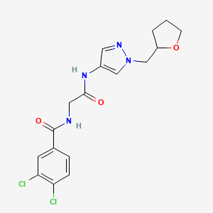 3,4-dichloro-N-[2-oxo-2-[[1-(oxolan-2-ylmethyl)pyrazol-4-yl]amino]ethyl]benzamide