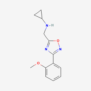 molecular formula C13H15N3O2 B7567540 N-[[3-(2-methoxyphenyl)-1,2,4-oxadiazol-5-yl]methyl]cyclopropanamine 