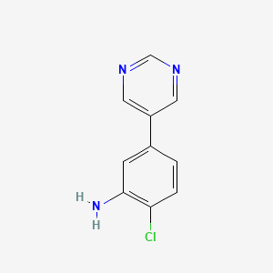 molecular formula C10H8ClN3 B7568439 2-Chloro-5-pyrimidin-5-ylaniline 
