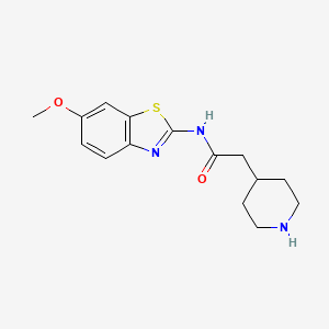 molecular formula C15H19N3O2S B7576609 N-(6-methoxy-1,3-benzothiazol-2-yl)-2-piperidin-4-ylacetamide 