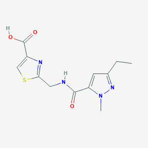 molecular formula C12H14N4O3S B7579802 2-[[(5-Ethyl-2-methylpyrazole-3-carbonyl)amino]methyl]-1,3-thiazole-4-carboxylic acid 