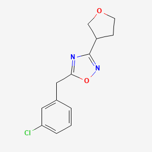 molecular formula C13H13ClN2O2 B7583208 5-[(3-Chlorophenyl)methyl]-3-(oxolan-3-yl)-1,2,4-oxadiazole 