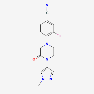 molecular formula C15H14FN5O B7584056 3-Fluoro-4-[4-(1-methylpyrazol-4-yl)-3-oxopiperazin-1-yl]benzonitrile 