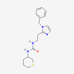 molecular formula C18H24N4OS B7584938 1-[2-(1-Benzylimidazol-2-yl)ethyl]-3-(thian-3-yl)urea 