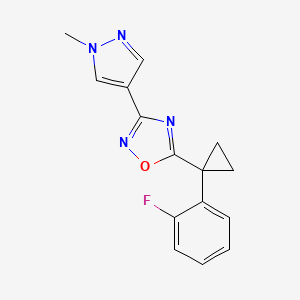 molecular formula C15H13FN4O B7585161 5-[1-(2-Fluorophenyl)cyclopropyl]-3-(1-methylpyrazol-4-yl)-1,2,4-oxadiazole 