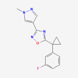 molecular formula C15H13FN4O B7585177 5-[1-(3-Fluorophenyl)cyclopropyl]-3-(1-methylpyrazol-4-yl)-1,2,4-oxadiazole 