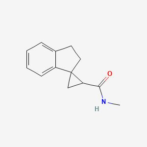 molecular formula C13H15NO B7586699 N-methylspiro[1,2-dihydroindene-3,2'-cyclopropane]-1'-carboxamide 