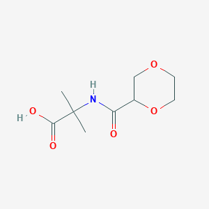 molecular formula C9H15NO5 B7587324 2-(1,4-Dioxane-2-carbonylamino)-2-methylpropanoic acid 