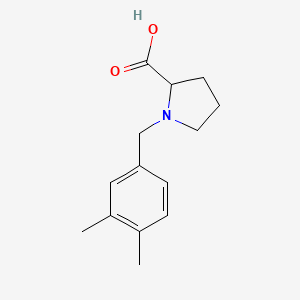 molecular formula C14H19NO2 B7588297 1-[(3,4-Dimethylphenyl)methyl]pyrrolidine-2-carboxylic acid 