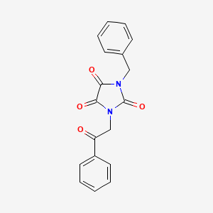 molecular formula C18H14N2O4 B7603752 1-Benzyl-3-phenacylimidazolidine-2,4,5-trione 