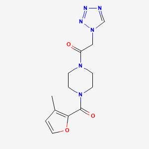 molecular formula C13H16N6O3 B7604477 1-[4-(3-Methylfuran-2-carbonyl)piperazin-1-yl]-2-(tetrazol-1-yl)ethanone 