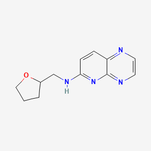 molecular formula C12H14N4O B7605344 N-(oxolan-2-ylmethyl)pyrido[2,3-b]pyrazin-6-amine 