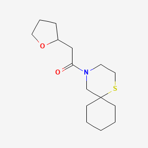 2-(Oxolan-2-yl)-1-(1-thia-4-azaspiro[5.5]undecan-4-yl)ethanone