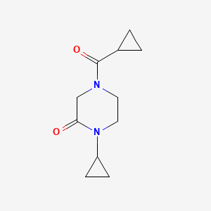 molecular formula C11H16N2O2 B7610555 4-(Cyclopropanecarbonyl)-1-cyclopropylpiperazin-2-one 