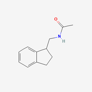 molecular formula C12H15NO B7614904 N-(2,3-Dihydro-1H-inden-1-ylmethyl)acetamide 