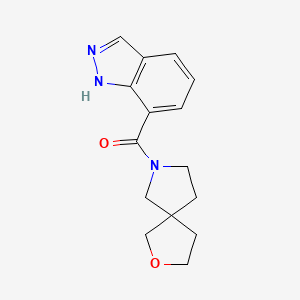 molecular formula C15H17N3O2 B7616735 1H-indazol-7-yl(2-oxa-7-azaspiro[4.4]nonan-7-yl)methanone 