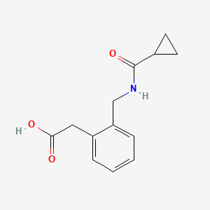 2-[2-[(Cyclopropanecarbonylamino)methyl]phenyl]acetic acid