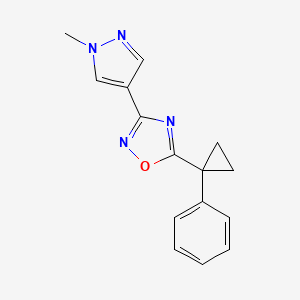 molecular formula C15H14N4O B7618449 3-(1-Methylpyrazol-4-yl)-5-(1-phenylcyclopropyl)-1,2,4-oxadiazole 