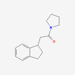 molecular formula C15H19NO B7621250 2-(2,3-dihydro-1H-inden-1-yl)-1-pyrrolidin-1-ylethanone 