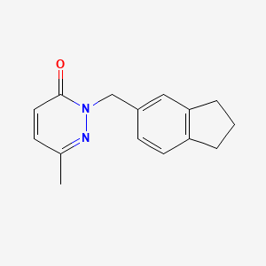 molecular formula C15H16N2O B7621343 2-(2,3-dihydro-1H-inden-5-ylmethyl)-6-methylpyridazin-3-one 