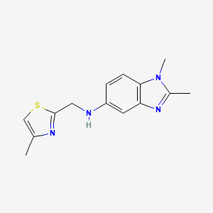 molecular formula C14H16N4S B7624529 1,2-dimethyl-N-[(4-methyl-1,3-thiazol-2-yl)methyl]benzimidazol-5-amine 