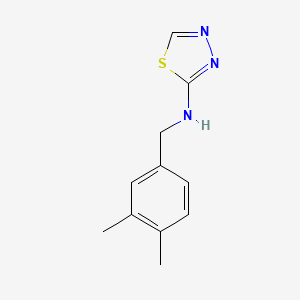 molecular formula C11H13N3S B7624842 N-[(3,4-dimethylphenyl)methyl]-1,3,4-thiadiazol-2-amine 