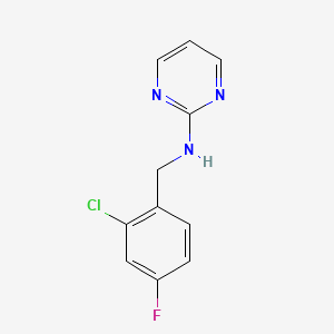 molecular formula C11H9ClFN3 B7625475 N-[(2-chloro-4-fluorophenyl)methyl]pyrimidin-2-amine 