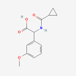 molecular formula C13H15NO4 B7627966 2-(Cyclopropanecarbonylamino)-2-(3-methoxyphenyl)acetic acid 