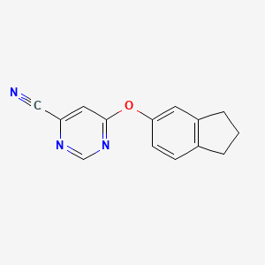 molecular formula C14H11N3O B7633578 6-(2,3-dihydro-1H-inden-5-yloxy)pyrimidine-4-carbonitrile 