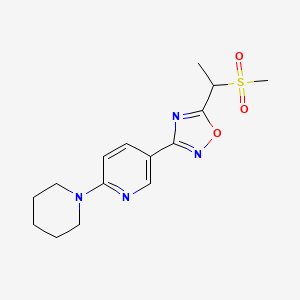 molecular formula C15H20N4O3S B7634012 5-(1-Methylsulfonylethyl)-3-(6-piperidin-1-ylpyridin-3-yl)-1,2,4-oxadiazole 