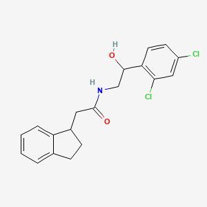 molecular formula C19H19Cl2NO2 B7634813 N-[2-(2,4-dichlorophenyl)-2-hydroxyethyl]-2-(2,3-dihydro-1H-inden-1-yl)acetamide 