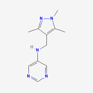 molecular formula C11H15N5 B7637808 N-[(1,3,5-trimethylpyrazol-4-yl)methyl]pyrimidin-5-amine 