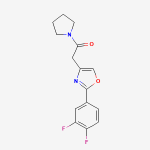 molecular formula C15H14F2N2O2 B7639278 2-[2-(3,4-Difluorophenyl)-1,3-oxazol-4-yl]-1-pyrrolidin-1-ylethanone 