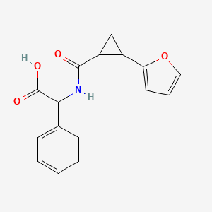 molecular formula C16H15NO4 B7640176 2-[[2-(Furan-2-yl)cyclopropanecarbonyl]amino]-2-phenylacetic acid 