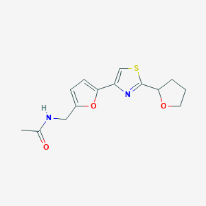 molecular formula C14H16N2O3S B7641113 N-[[5-[2-(oxolan-2-yl)-1,3-thiazol-4-yl]furan-2-yl]methyl]acetamide 