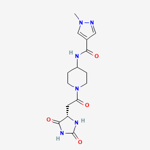 molecular formula C15H20N6O4 B7645961 N-[1-[2-[(4S)-2,5-dioxoimidazolidin-4-yl]acetyl]piperidin-4-yl]-1-methylpyrazole-4-carboxamide 