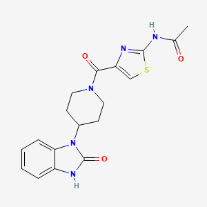 molecular formula C18H19N5O3S B7645993 N-[4-[4-(2-oxo-3H-benzimidazol-1-yl)piperidine-1-carbonyl]-1,3-thiazol-2-yl]acetamide 