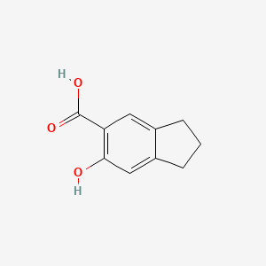 molecular formula C10H10O3 B7647143 6-Hydroxyindan-5-carboxylic acid 