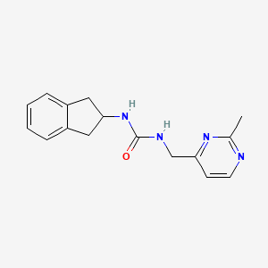 1-(2,3-dihydro-1H-inden-2-yl)-3-[(2-methylpyrimidin-4-yl)methyl]urea