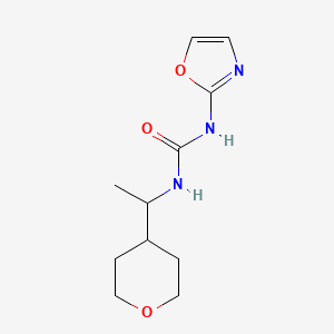 molecular formula C11H17N3O3 B7655636 1-[1-(Oxan-4-yl)ethyl]-3-(1,3-oxazol-2-yl)urea 