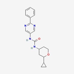 molecular formula C19H22N4O2 B7656315 1-(2-Cyclopropyloxan-4-yl)-3-(2-phenylpyrimidin-5-yl)urea 